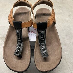 Taos stupendous black and brown with stone detail sandals